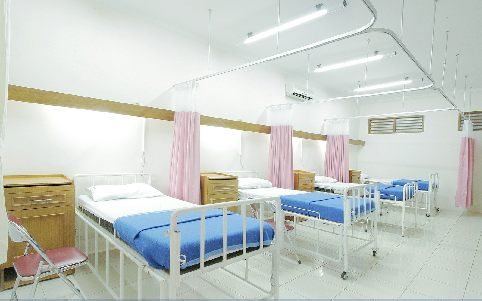 Hospital ward with empty beds